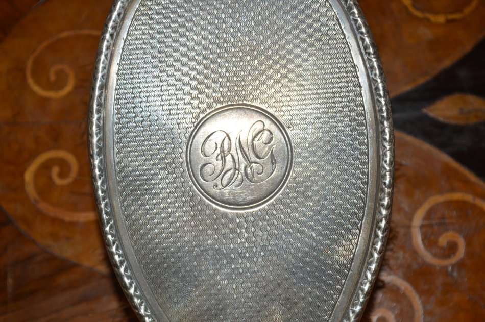 set of 3 silver hallmarked Birmingham Art Deco grooming brushes