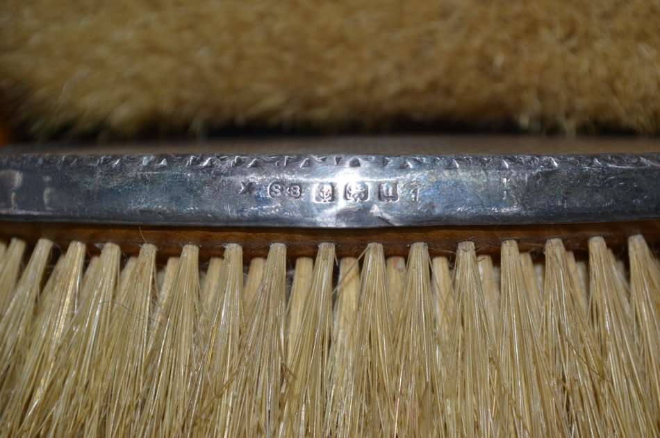 set of 3 silver hallmarked Birmingham Art Deco grooming brushes