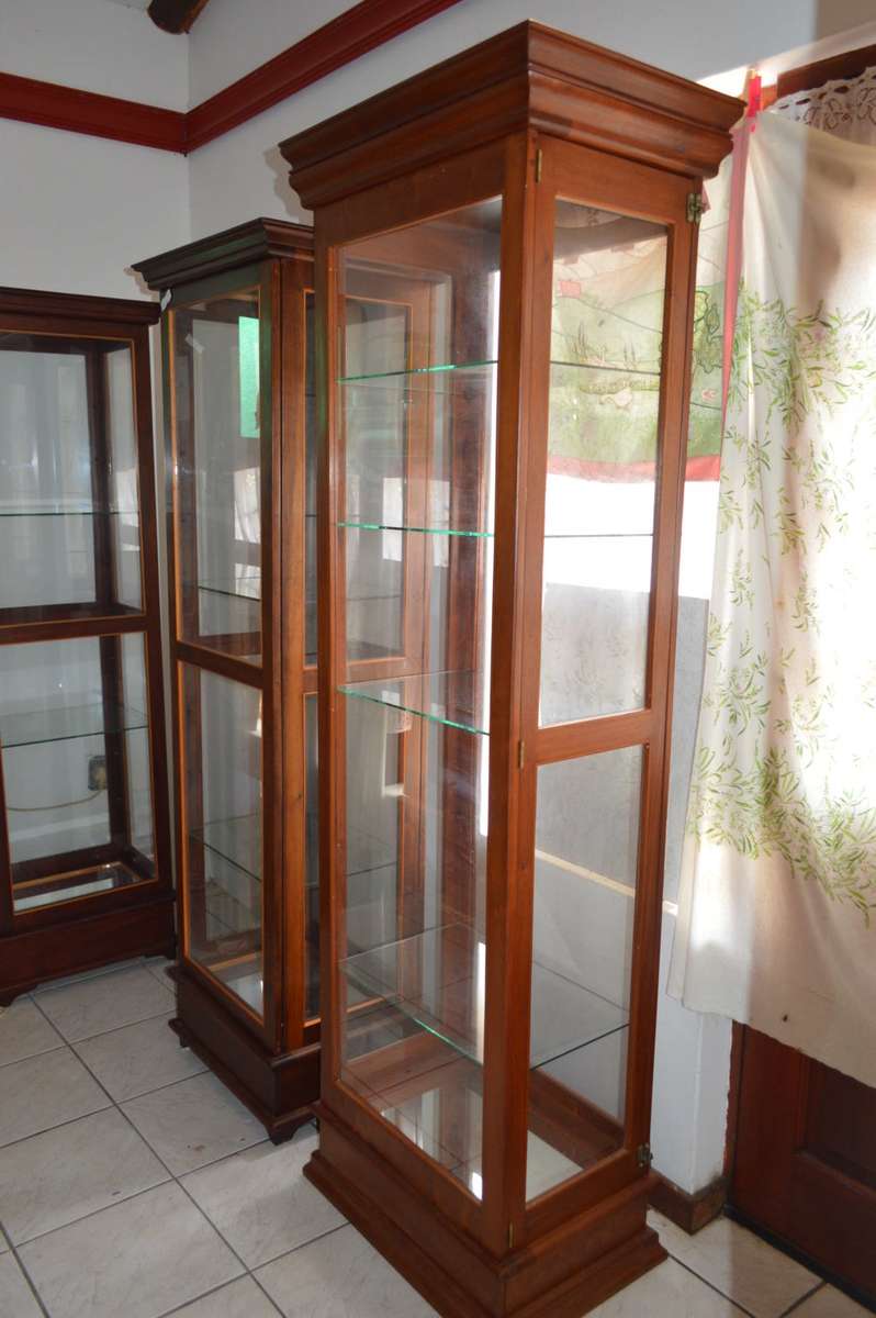 Luxurious tall solid Rose wood display cabinet