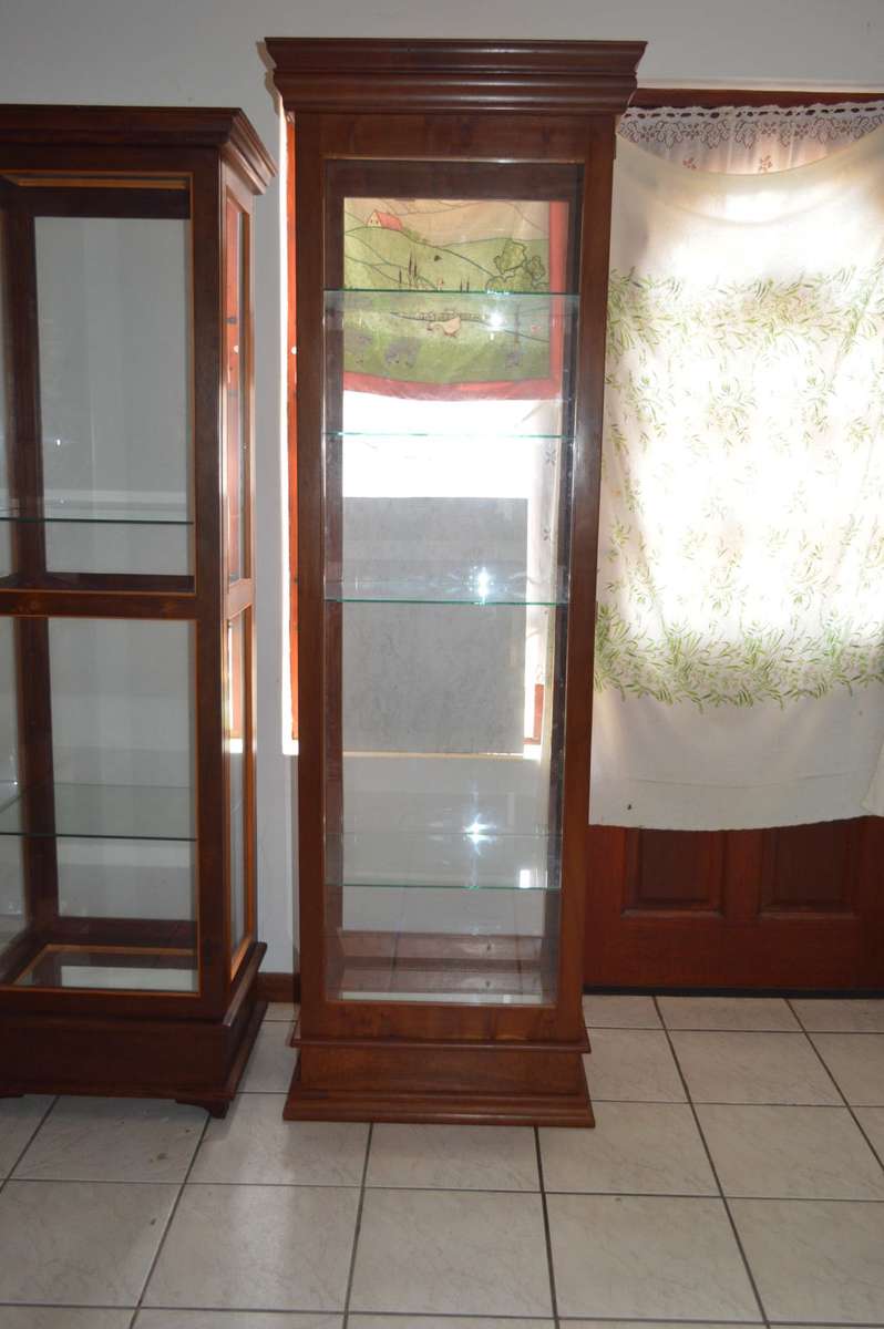 Luxurious tall solid Rose wood display cabinet