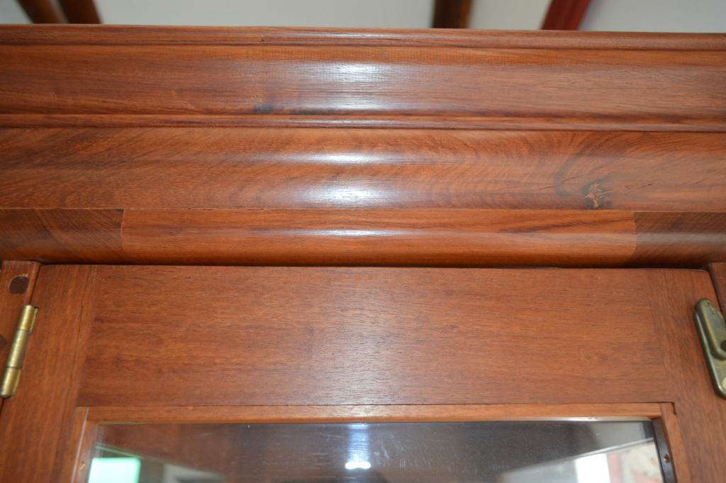 Luxurious tall solid Rose wood display cabinet