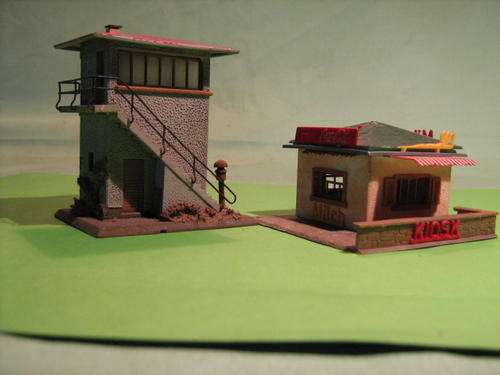 A KIOSK AND OTHER BUILDING HO