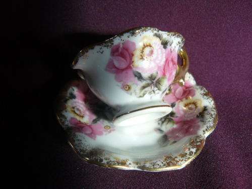 VERY CUTE OLD MINATURE CUP AND SAUCER