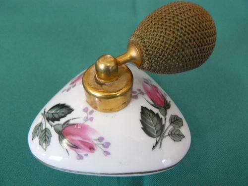 PERFUME BOTTLE DISPENSER