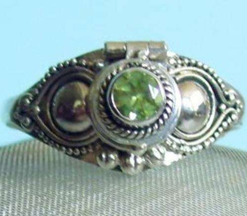 Gorgeous Silver Peridot Poison Locket ring...
