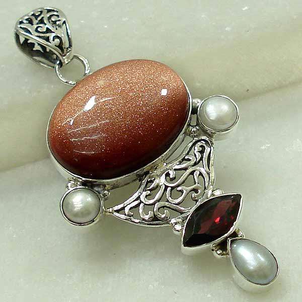 Exquisite Sterling Silver & Goldstone pendant...