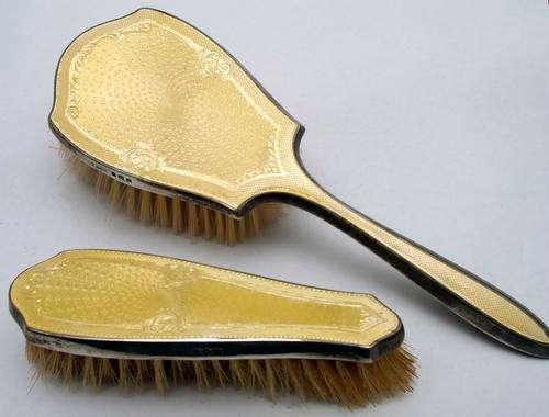 A pair of Hallmarked Silver Brushes with Art Nouveau Detailing