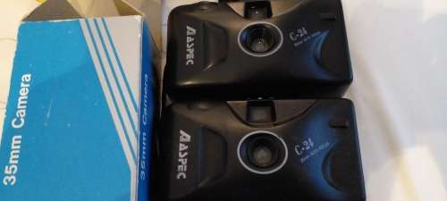 2× vintage Aspec c24 35mm. Point shoot cameras plus a 35mm. Computor flash model 220. Selling as is.