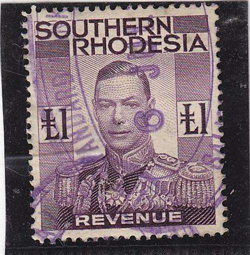 SOUTHERN RHODESIA 1937 KING GEORGE V , 1 POUND REVENUE STAMP USED    SEE SCAN