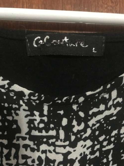 Size LARGE black and white top