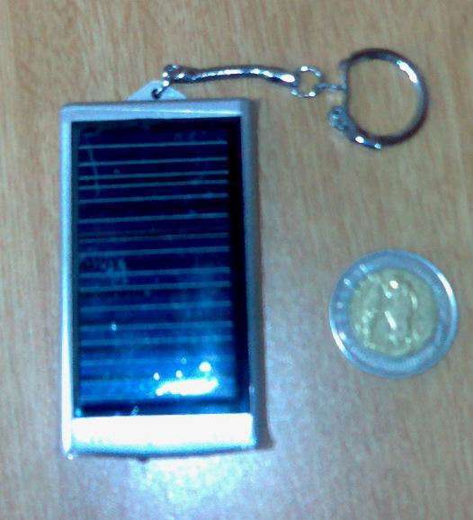 Solar Cell Phone Charger on a Keyring. Can also charge MP3, MP4, Digital Camera.