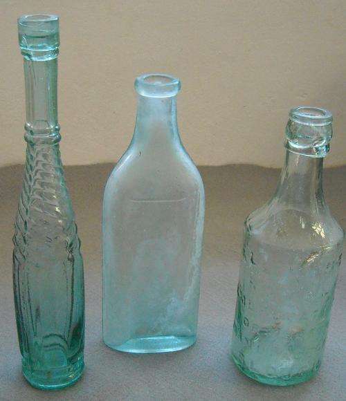 Three vintage bottles