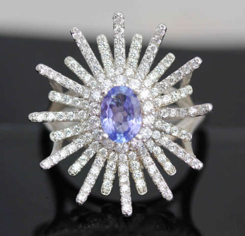 STUNNING 'STARBURST' TANZANITE AND STERLING SILVER RING. HAND-CRAFTED