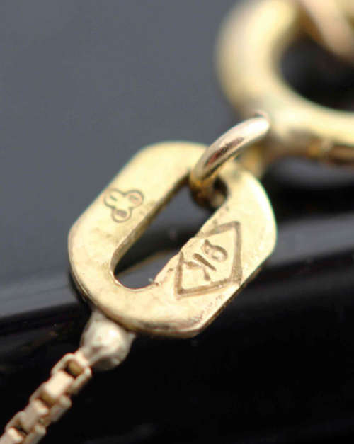 UNUSUAL VINTAGE CRYSTAL AND 9CT YELLOW GOLD FRINGED NECKLACE. 375. SHEFFIELD ASSAY