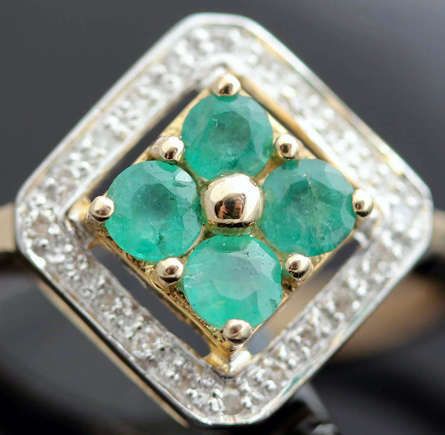 MODERN EMERALD AND DIAMOND 9CT YELLOW GOLD RING. GEOMETRIC DESIGN. *JEWELLER VALUATION R8'000.00*