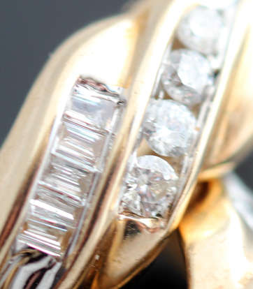 VINTAGE DIAMOND AND 9CT YELLOW GOLD EARRINGS. MODERN TWISTED DESIGN BAGUETTE & ROUND CUT. HALLMARKED
