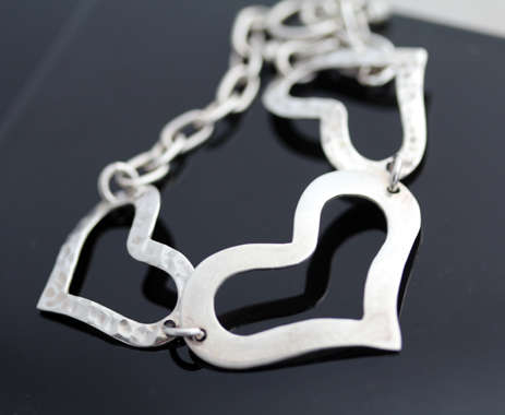 FUNKY VINTAGE STERLING SILVER HEART DESIGN BRACELET WITH TOGGLE CLOSURE. 925