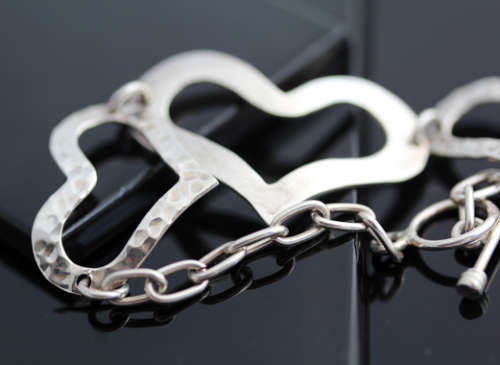 FUNKY VINTAGE STERLING SILVER HEART DESIGN BRACELET WITH TOGGLE CLOSURE. 925