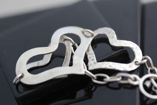 FUNKY VINTAGE STERLING SILVER HEART DESIGN BRACELET WITH TOGGLE CLOSURE. 925