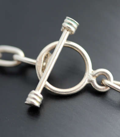 FUNKY VINTAGE STERLING SILVER HEART DESIGN BRACELET WITH TOGGLE CLOSURE. 925