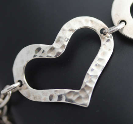 FUNKY VINTAGE STERLING SILVER HEART DESIGN BRACELET WITH TOGGLE CLOSURE. 925