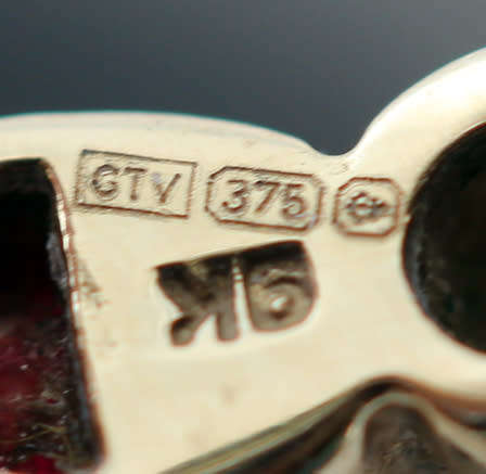 RUBY AND PERIDOT FULL ETERNITY 9CT YELLOW GOLD RING. 375. BIRMINGHAM ASSAY! HEAVY. THICK SHANK