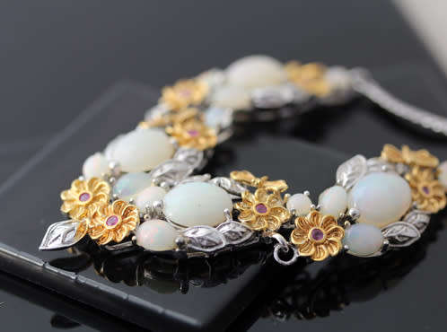 STUNNING HEAVY FLORAL DESIGN FIRE OPAL AND RUBY STERLING SILVER PENDANT AND CHAIN. SOLID 925