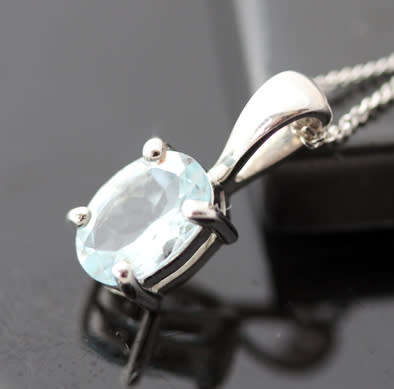 DELICATE ICE BLUE AQUAMARINE 9CT WHITE GOLD PENDANT AND CHAIN. 375