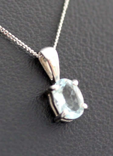 DELICATE ICE BLUE AQUAMARINE 9CT WHITE GOLD PENDANT AND CHAIN. 375