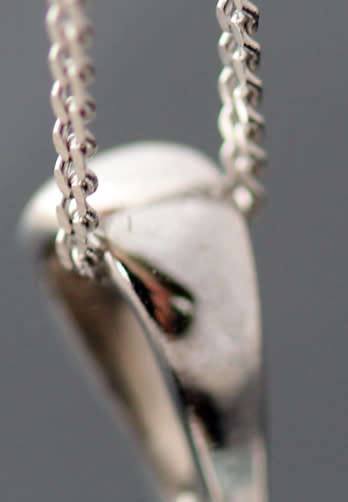 DELICATE ICE BLUE AQUAMARINE 9CT WHITE GOLD PENDANT AND CHAIN. 375