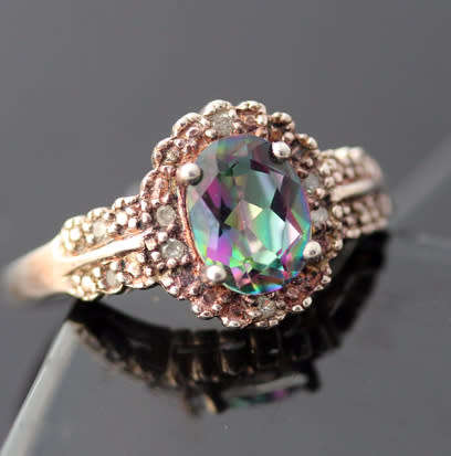 UNUSUAL MYSTIC TOPAZ AND DIAMOND STERLING SILVER RING. 925. LIMITED EDITION HALLMARK
