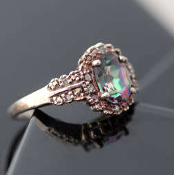 UNUSUAL MYSTIC TOPAZ AND DIAMOND STERLING SILVER RING. 925. LIMITED EDITION HALLMARK