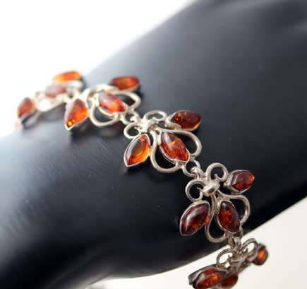 VINTAGE BIG AND BOLD BALTIC AMBER STERLING SILVER BRACELET. 925, GORGEOUS GLOWING AMBER!