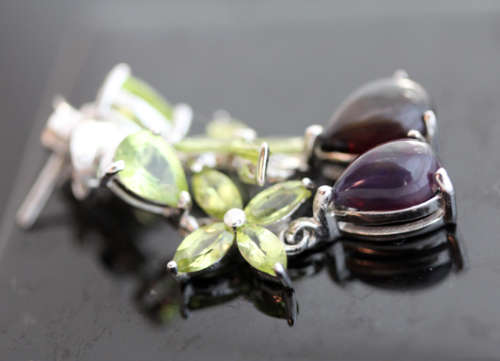 GORGEOUS REAL PERIDOT FLORAL EARRINGS WITH PEAR-CUT BLACK OPAL DROPS IN STERLING SILVER.