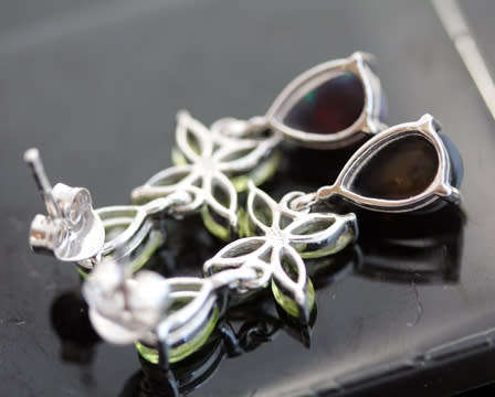 GORGEOUS REAL PERIDOT FLORAL EARRINGS WITH PEAR-CUT BLACK OPAL DROPS IN STERLING SILVER.