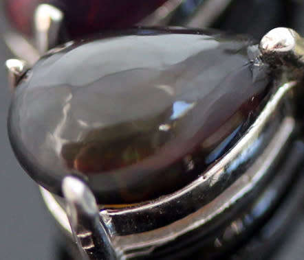 GORGEOUS REAL PERIDOT FLORAL EARRINGS WITH PEAR-CUT BLACK OPAL DROPS IN STERLING SILVER.