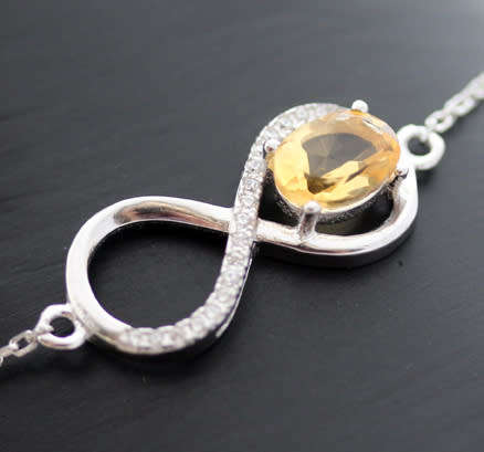 DELICATE CITRINE AND CUBIC ZIRCONIA STERLING SILVER BRACELET. 925.