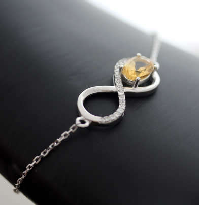 DELICATE CITRINE AND CUBIC ZIRCONIA STERLING SILVER BRACELET. 925.