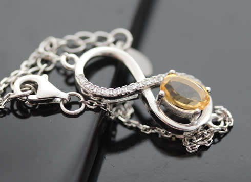 DELICATE CITRINE AND CUBIC ZIRCONIA STERLING SILVER BRACELET. 925.