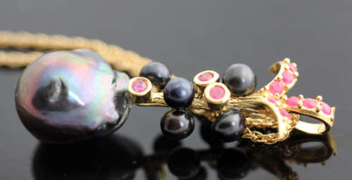 BLACK TAHITIAN BAROQUE PEARL AND NATURAL RUBY GOLD-HUED STERLING SILVER PENDANT ROPE CHAIN