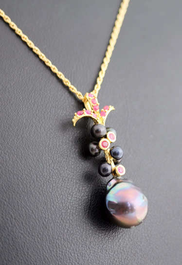 BLACK TAHITIAN BAROQUE PEARL AND NATURAL RUBY GOLD-HUED STERLING SILVER PENDANT ROPE CHAIN