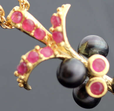 BLACK TAHITIAN BAROQUE PEARL AND NATURAL RUBY GOLD-HUED STERLING SILVER PENDANT ROPE CHAIN