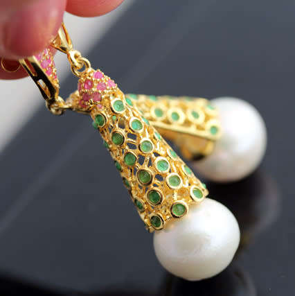 STRIKING CONTEMPORARY RUBY, EMERALD AND BAROQUE PEARL GOLD-HUED STERLING SILVER DANGLY EARRINGS. 925
