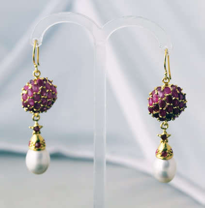 SUMPTUOUS RUBY AND PEARL GOLD-HUED STERLING SILVER DROP & DANGLE EARRINGS. 925