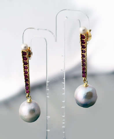 LONG DRAMATIC DROP & DANGLE EARRINGS WITH BAROQUE PEARLS & RUBIES IN GOLD-HUED STERLING SILVER. 925