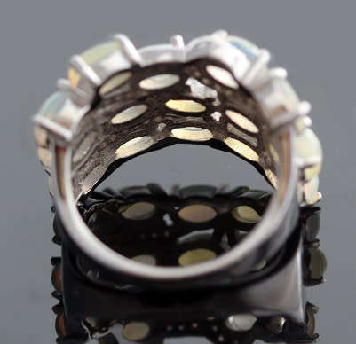 BROAD BAND STERLING SILVER RING SET WITH AAA QUALITY RAINBOW WHITE OPALS.