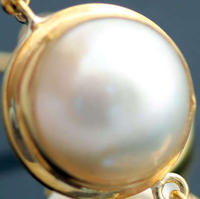 NATURAL PEARL & HEART CUT SWISS BLUE TOPAZ GOLD-HUED STERLING SILVER DANGLY EARRINGS. 925