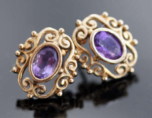 VINTAGE 9CT YELLOW GOLD FILIGREE STUD EARRINGS WITH OVAL FACETED AMETHYSTS. 375