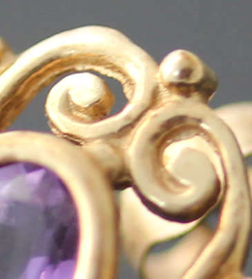 VINTAGE 9CT YELLOW GOLD FILIGREE STUD EARRINGS WITH OVAL FACETED AMETHYSTS. 375