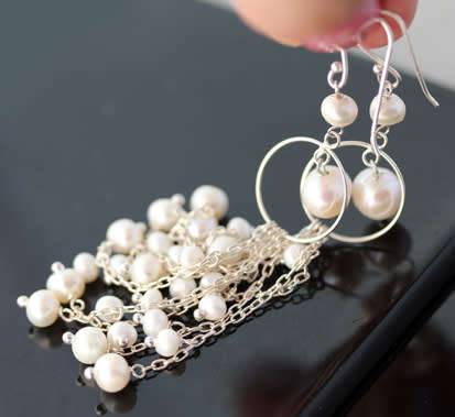 VERY LONG (80mm) WATERFALL CHAIN STERLING SILVER AND CREAMY BAROQUE PEARL DROP EARRINGS. 925